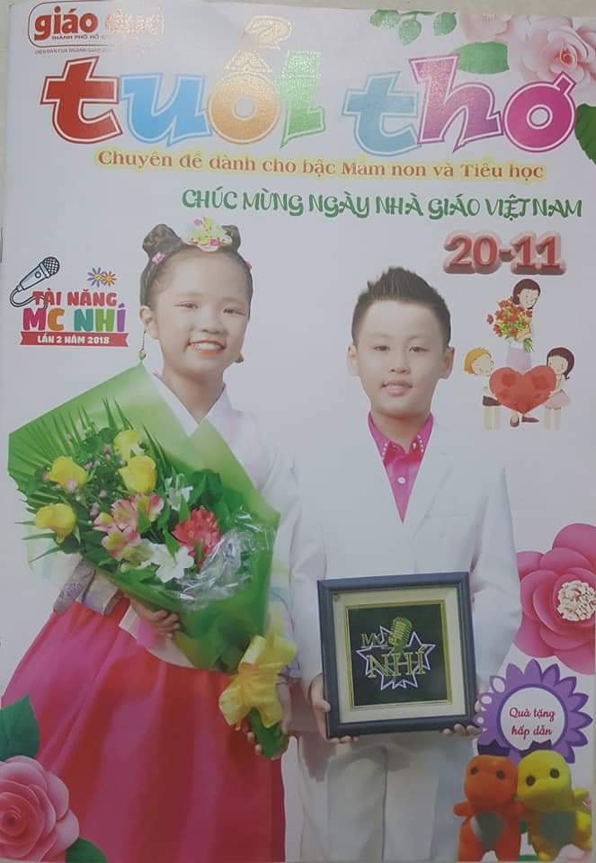 Quán quân Cao Nguyễn Tuấn Vinh và á quân Sim Bo Min Tìm kiếm tài năng Mc nhí 2018 trên trang bìa của báo Tuổi Thơ.